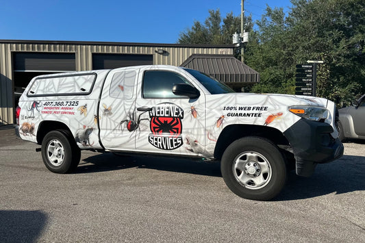 Webenex Services truck parked at the roll-up doors of a Clermont warehouse and office complex
